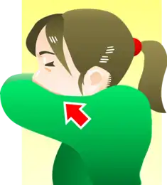 上着の内側や袖（そで）で覆う